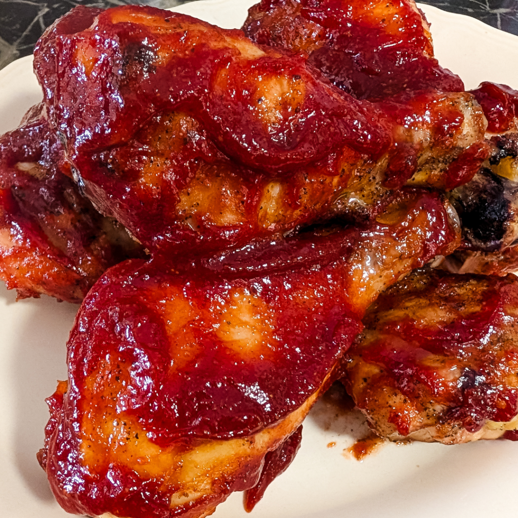 Juicy smoky BBQ chicken thighs with brown sugar glaze.