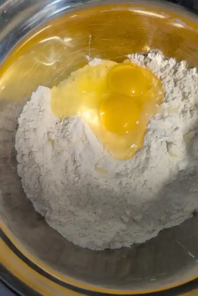 adding egg to the dry ingredients