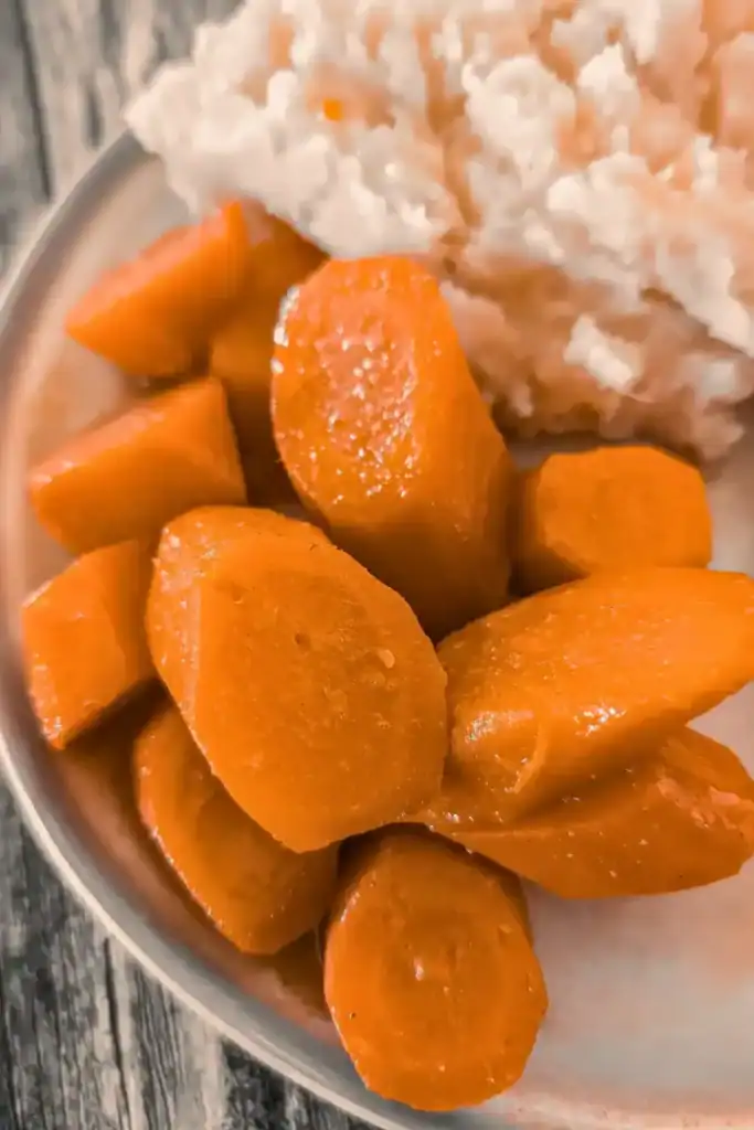 close up top down view of honey ginger glazed carrots