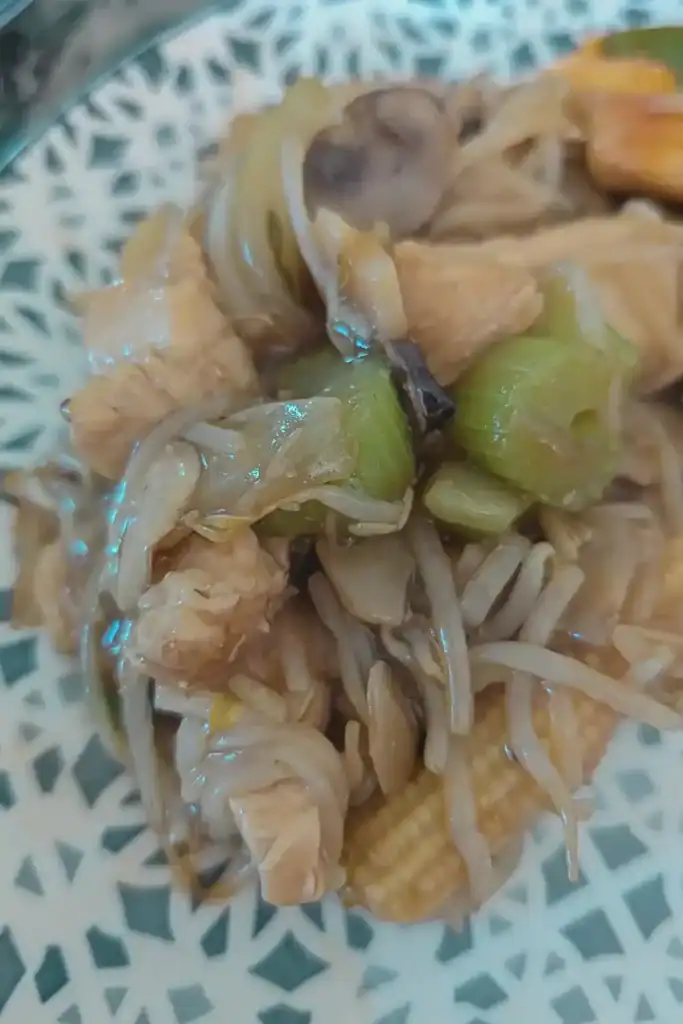 from above another angle of the chicken chop suey on plate