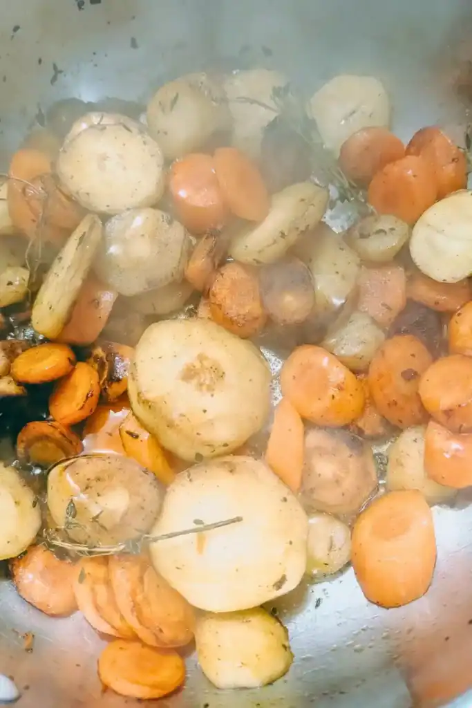 cooking the root vegetables with honey