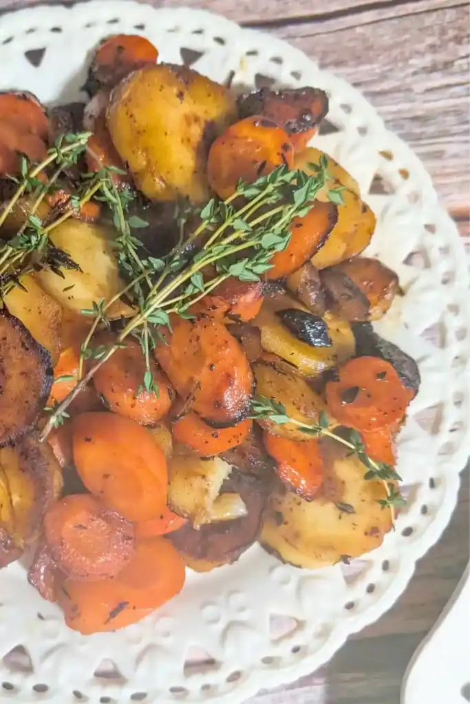 sauteed carrots and parsnips with sprigs of fresh thyme