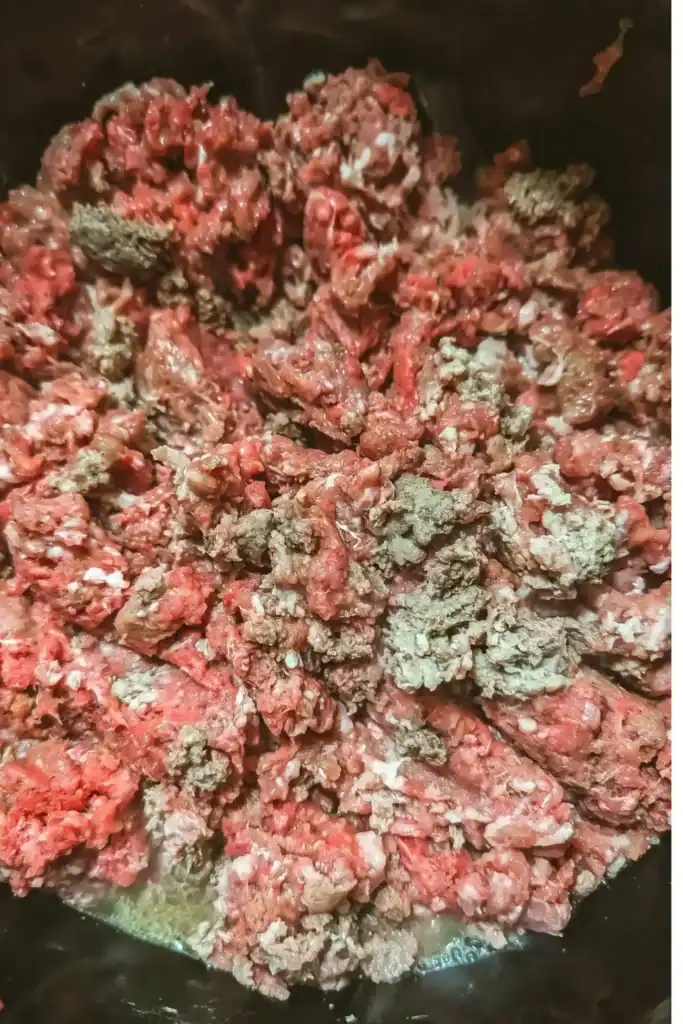 browning the ground meat and breaking it up