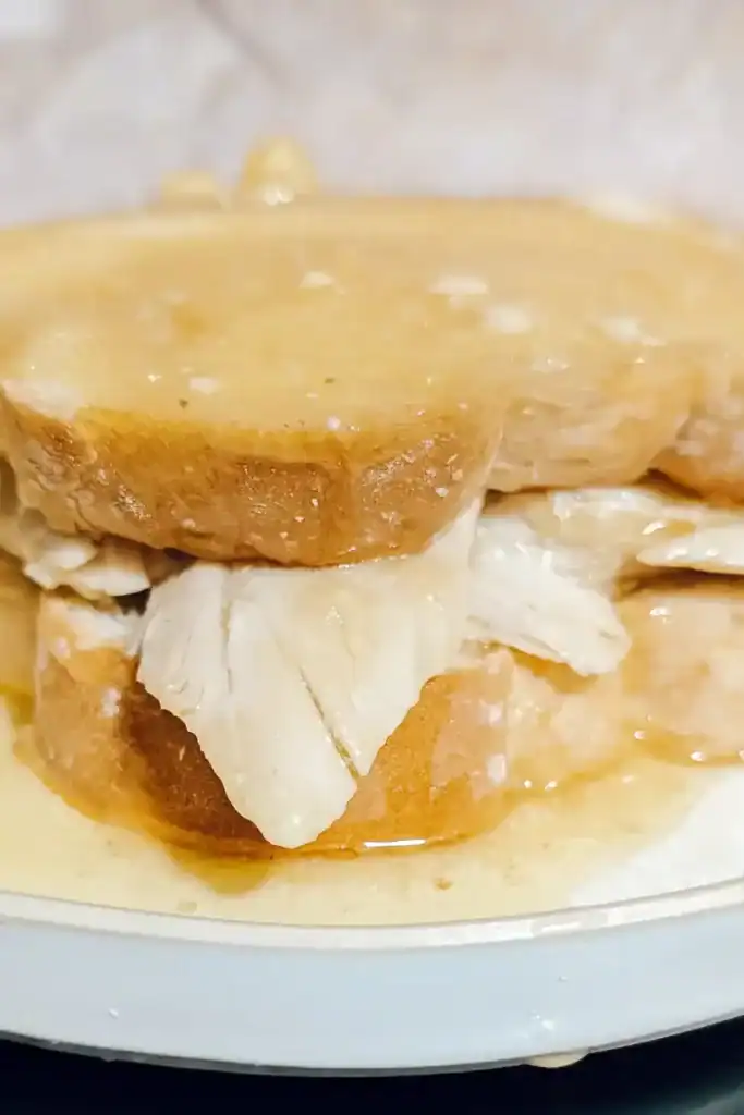 side angle of hot turkey sandwich with gravy