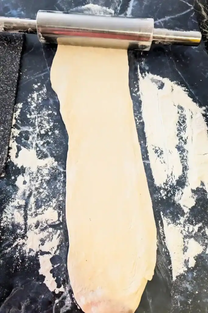 rolled out pizza dough ball