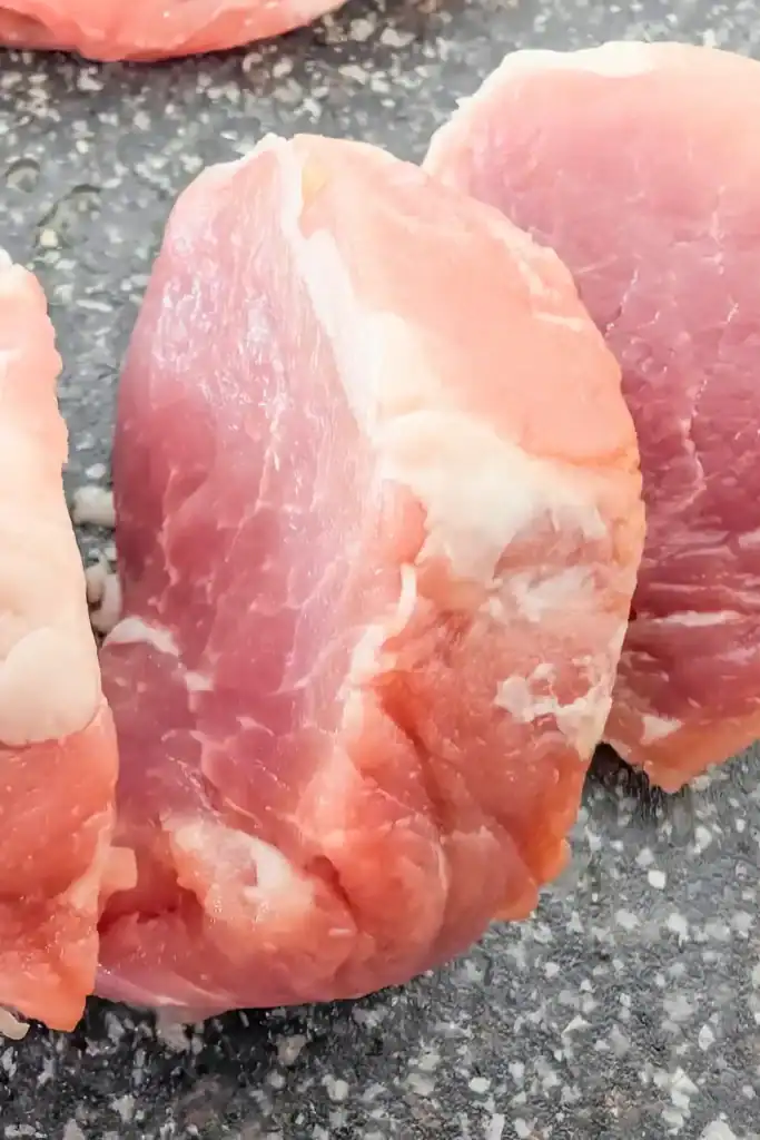 slicing pork medallions
