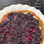 the top of the no bake cherry cheesecake
