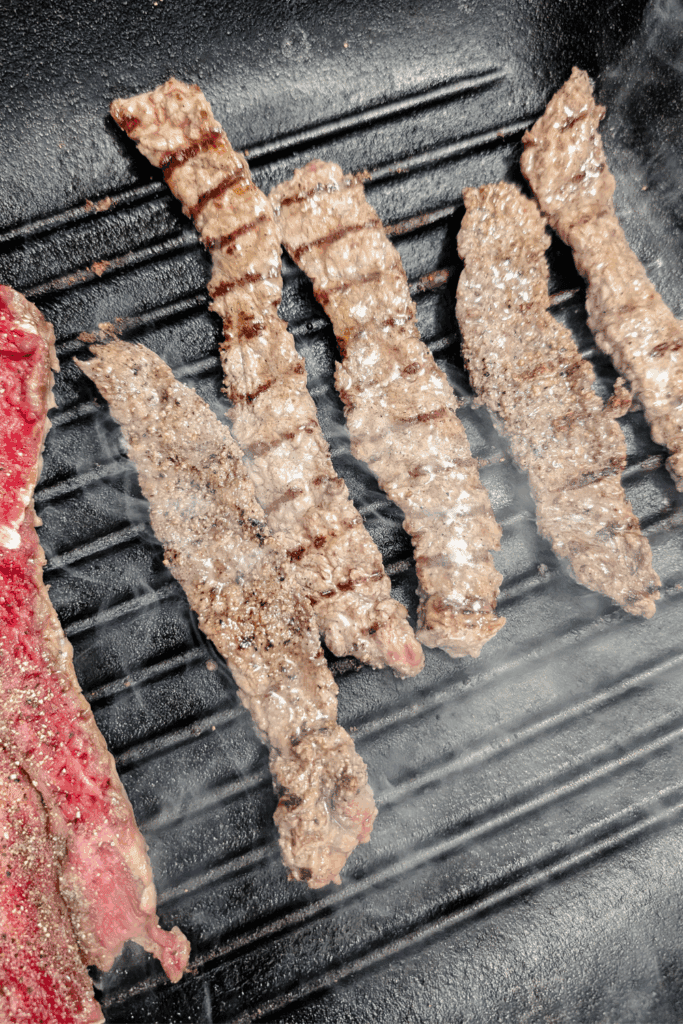 cooking the steak strips in batches in grill pan