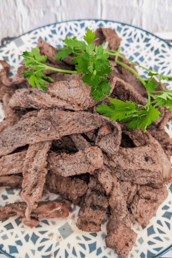 serving grilled steak strips