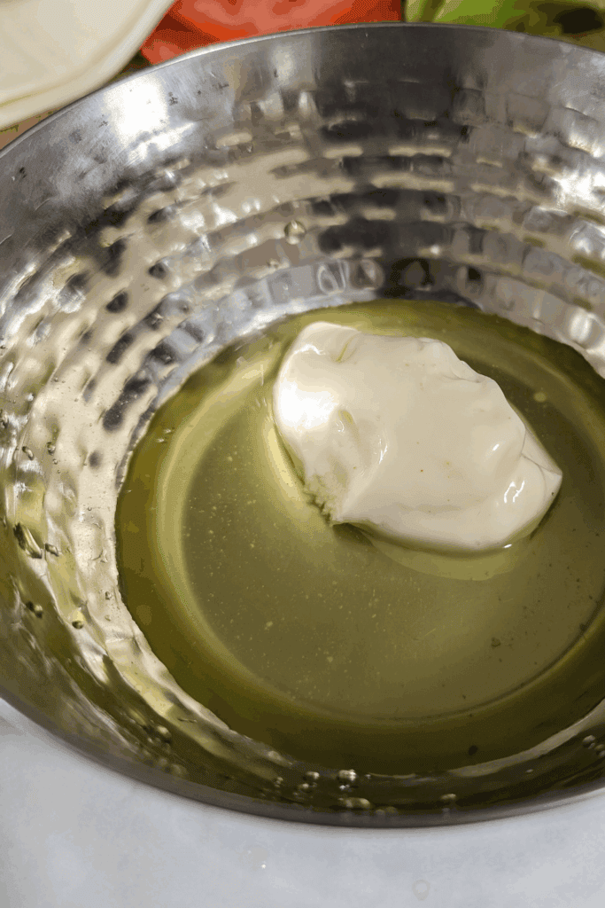 adding pickle juice to sauce