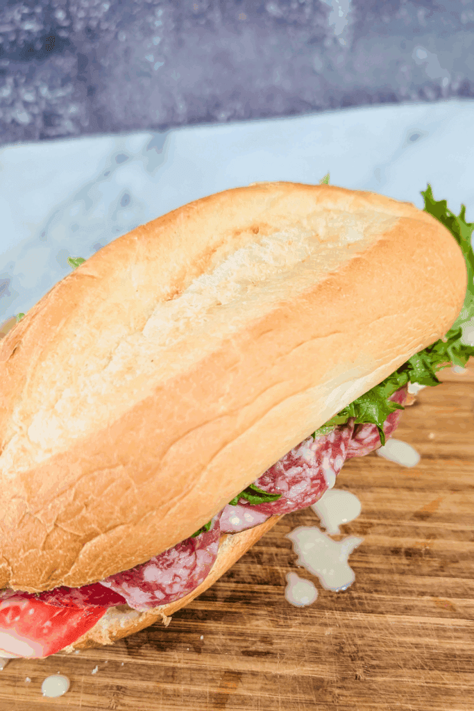 ready to cut the assorted sub sandwich