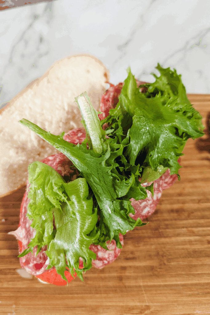 topping with leafy green lettuce