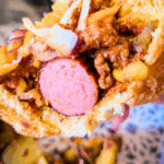 cut in half ready to eat chili dog