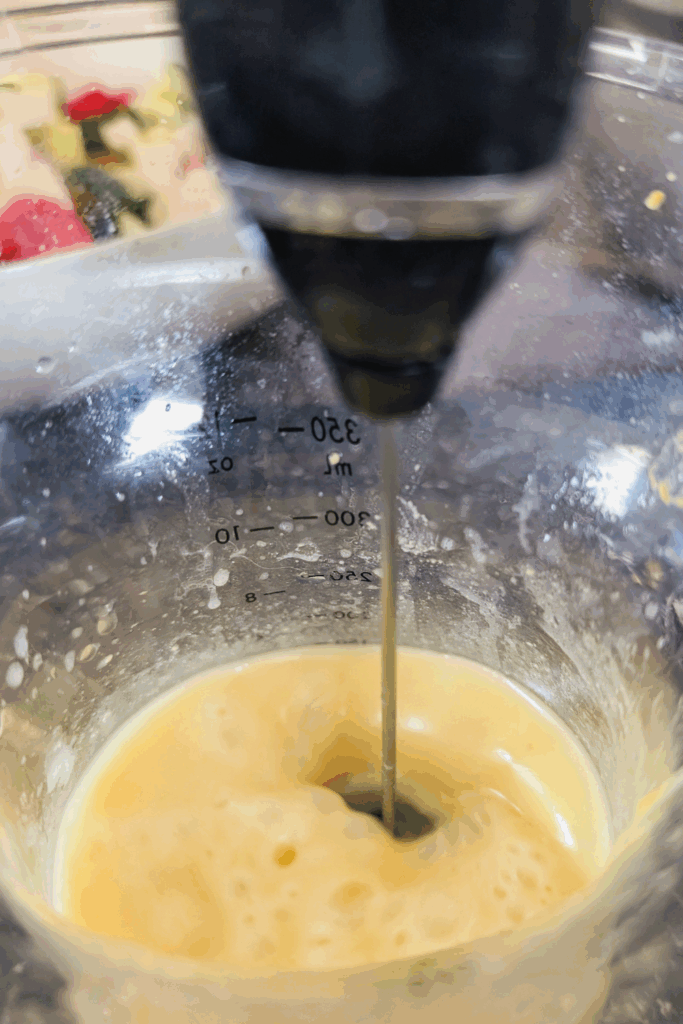 mixing the lemon dijon vinaigrette for dressing