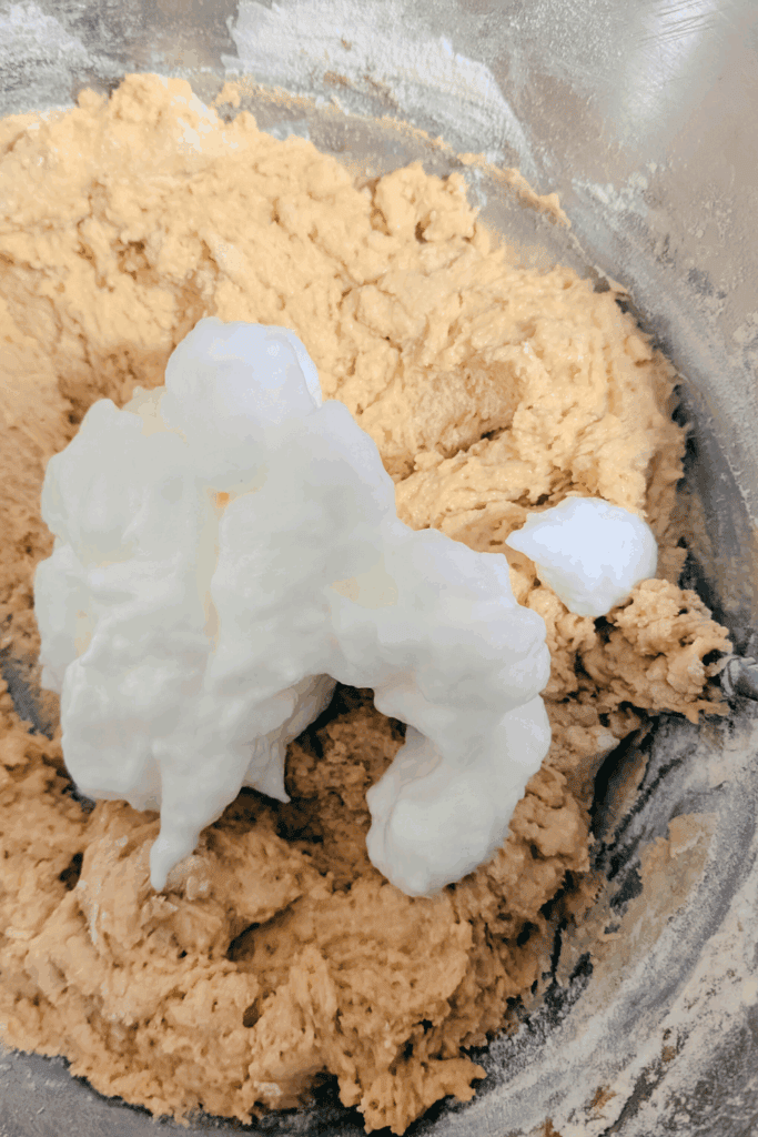 folding in beaten egg whites to maple donut batter