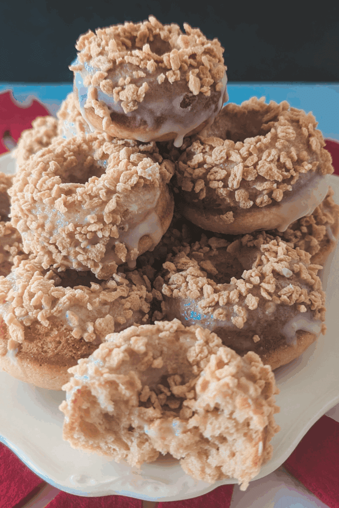 maple donuts stacked on plate