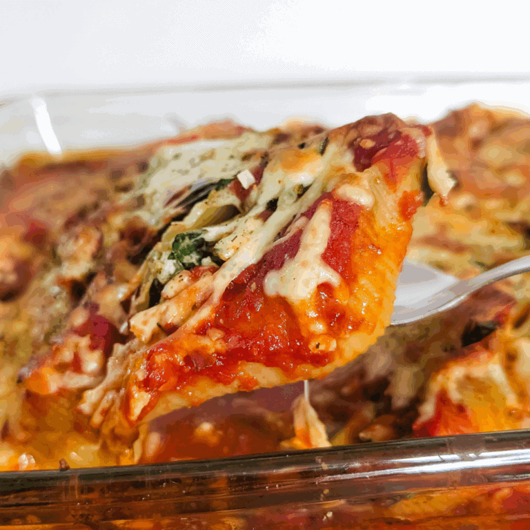 Cheesy lasagna slice with melted cheese, pasta, and rich tomato sauce. Delicious homemade Italian casserole perfect for family dinners.