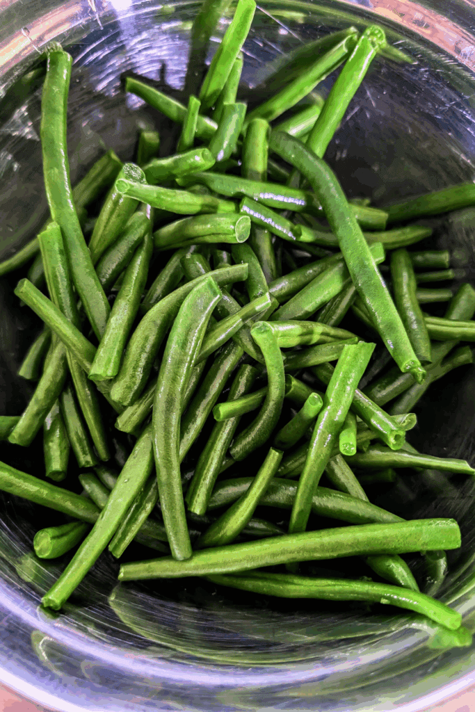 Green beans for cooking, fresh vegetable in a glass bowl, healthy meal ingredients, kitchen cooking prep, farm-fresh produce.