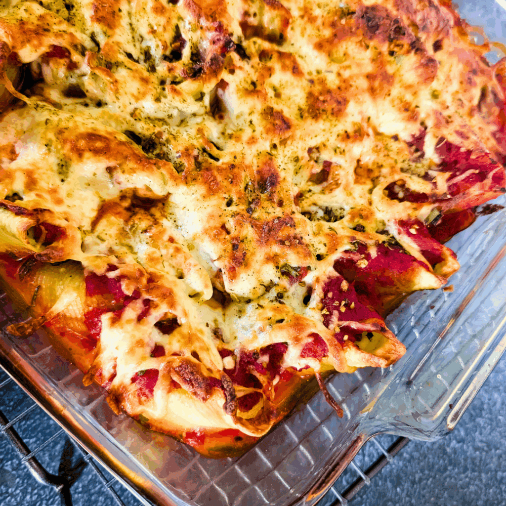 Baked stuffed pasta with cheese and herbs, ready to serve.