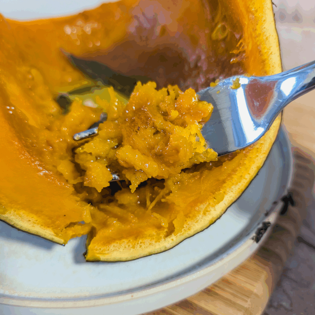 Fresh pumpkin flesh with smooth, vibrant texture for cooking and baking.