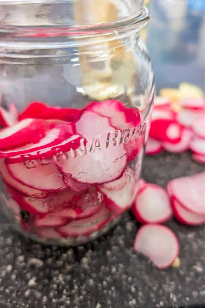 Pickled Radishes in a Mason Jar.