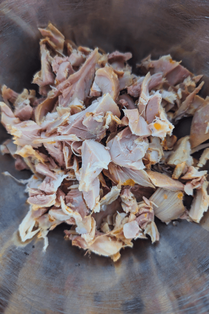 Shredded cooked chicken ready for wraps and sandwiches.