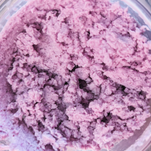 Creamy blueberry ice cream with a rich blueberry reduction swirl.