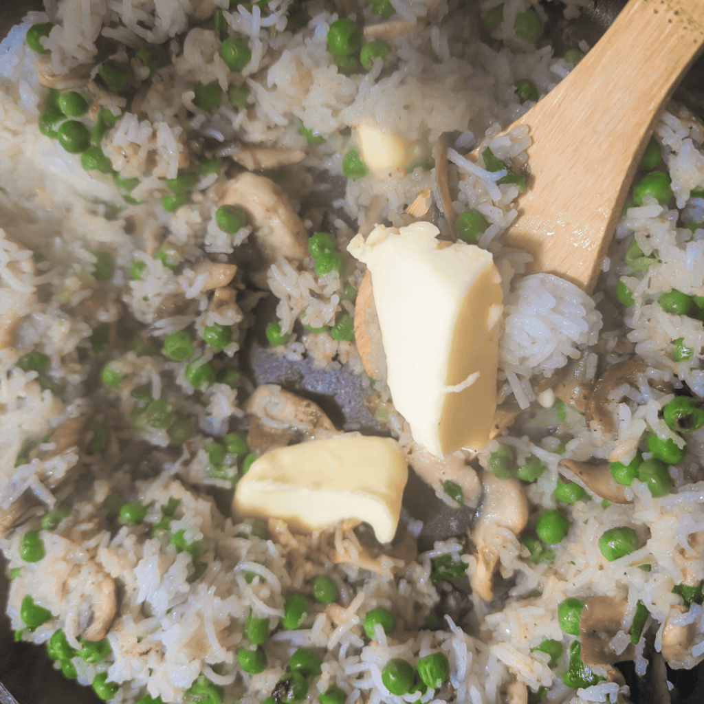 Delicious mushroom rice pilaf with ramps and peas, perfect for a quick and flavorful meal.