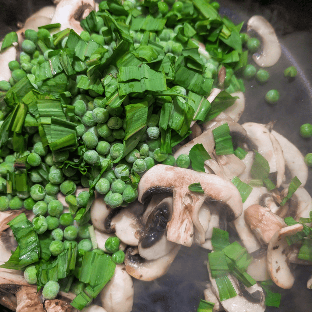 Healthy ingredients for easy mushroom rice pilaf with ramps and peas.