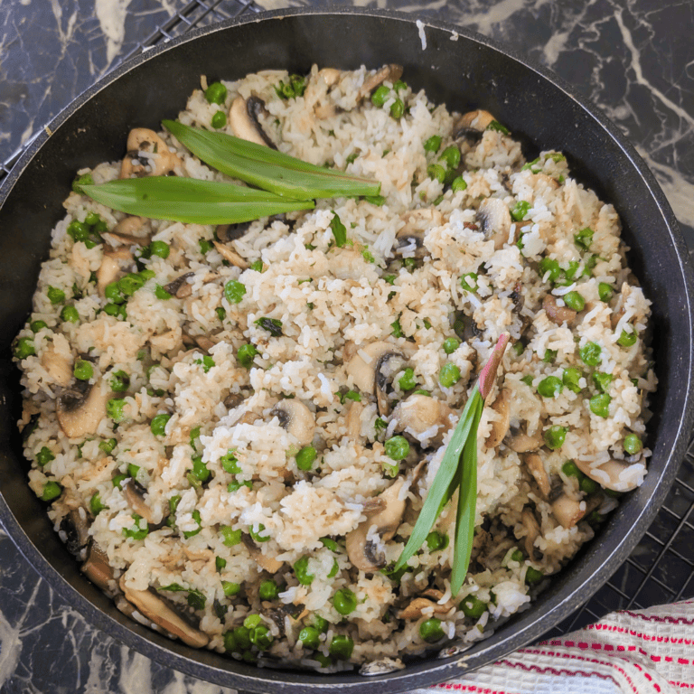 Delicious mushroom rice pilaf featuring ramps and peas, perfect for a flavorful vegetarian meal or s.