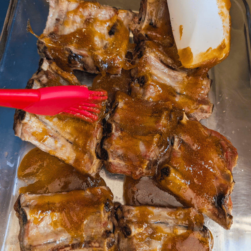 Delicious ribs coated with a sweet maple glaze, perfect for a flavorful barbecue meal.