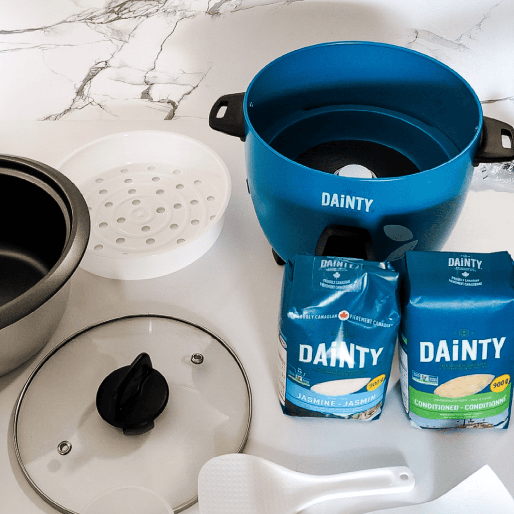 Dainty food steamer set with bowls and accessories for healthy cooking.