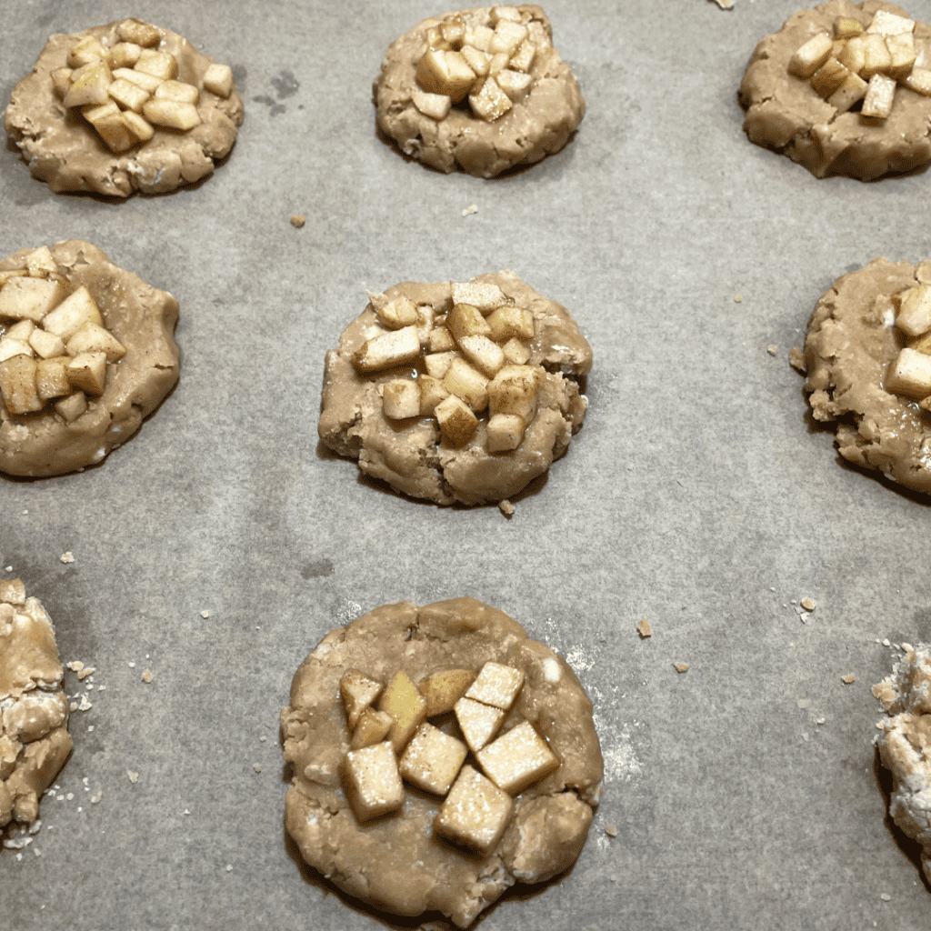 adding the apple mixture to the cookie center