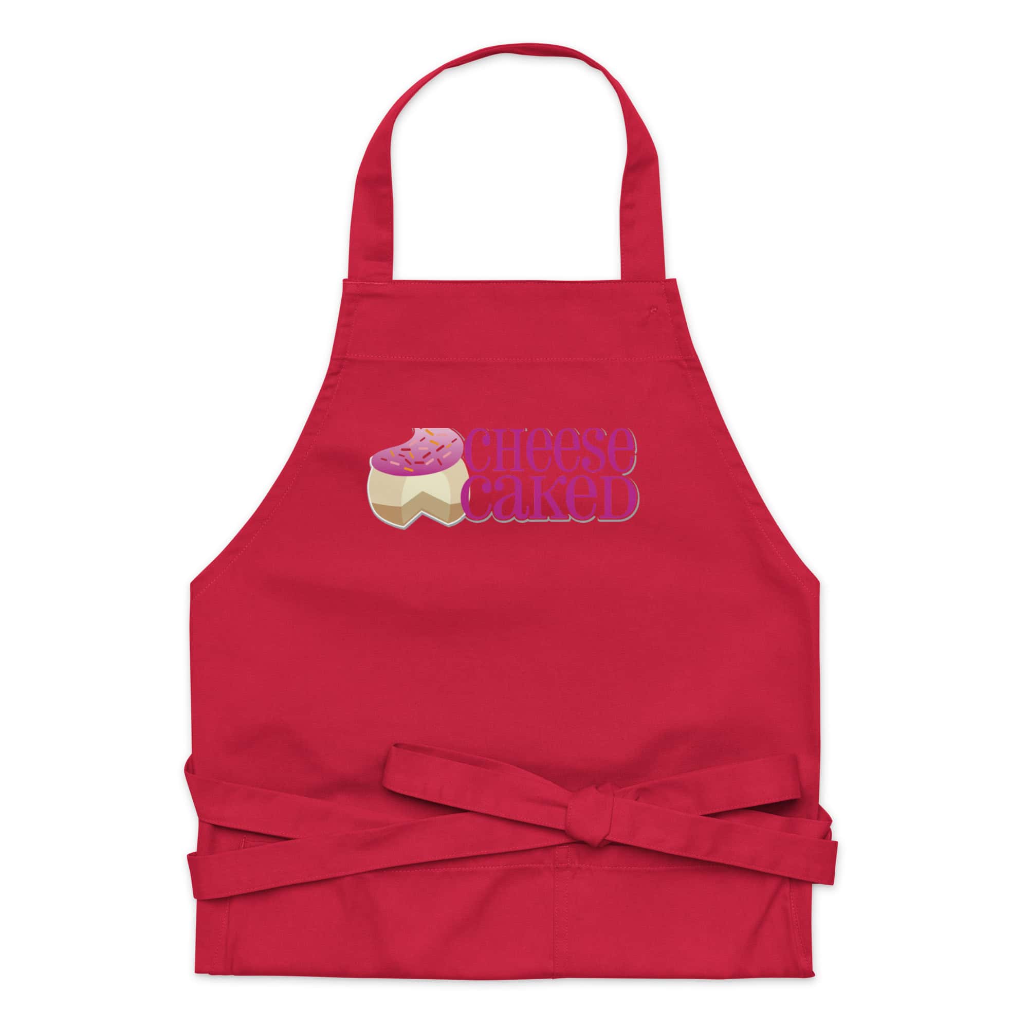 Apron with CheeseCaked logo and pink frosting cupcake design.