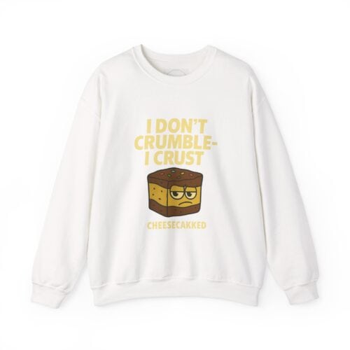 Funny cheesecake sweatshirt with "I Don't Crumble, I Crust" slogan and cartoon cheesecake graphic.