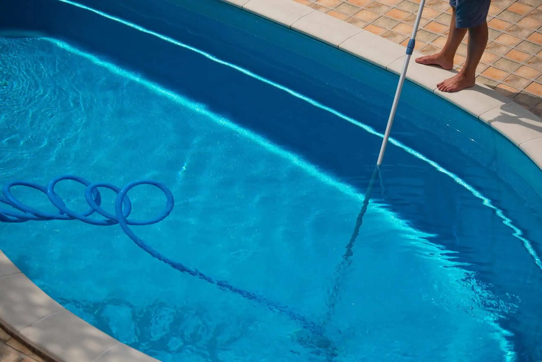 cpp-back3a vacuuming the pool