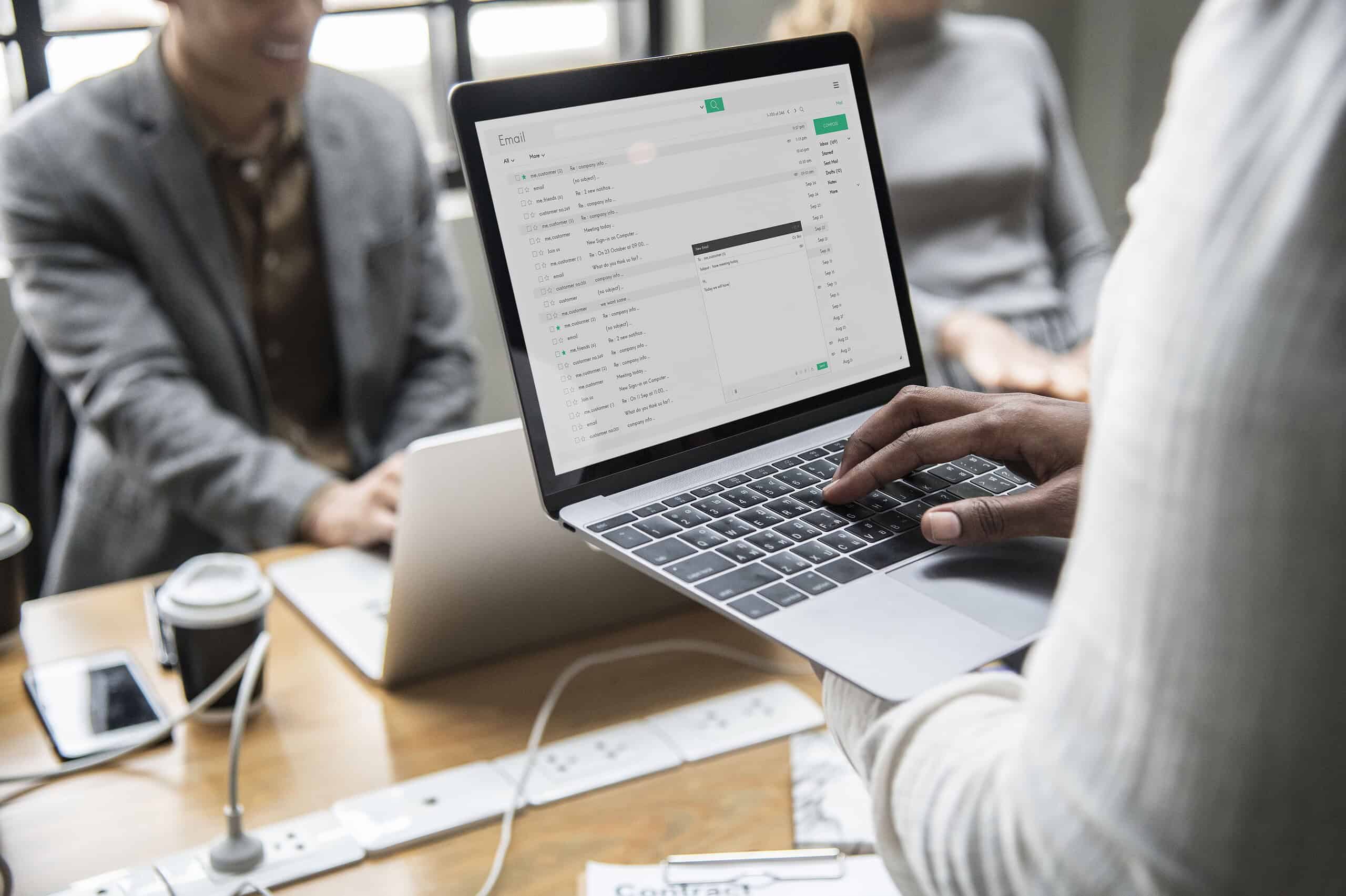 Man Checking His Email On A Laptop