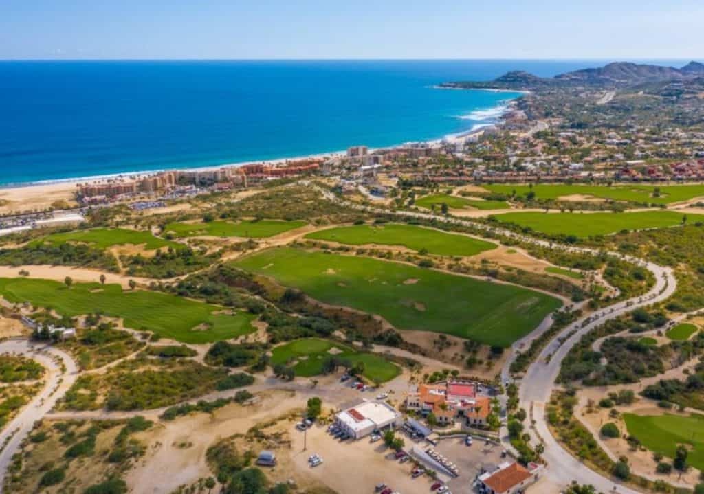 Panoramic Aerial Shot Of The Club Campestre Golf Course With The Sea Of Cortez In The Background Near San José Del Cabo.