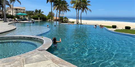 Luxury Ocean View Pool At Club Campestre With Lush Greenery And Palm Trees, Perfect For Relaxing Or Enjoying Scenic Golf Course Vistas.