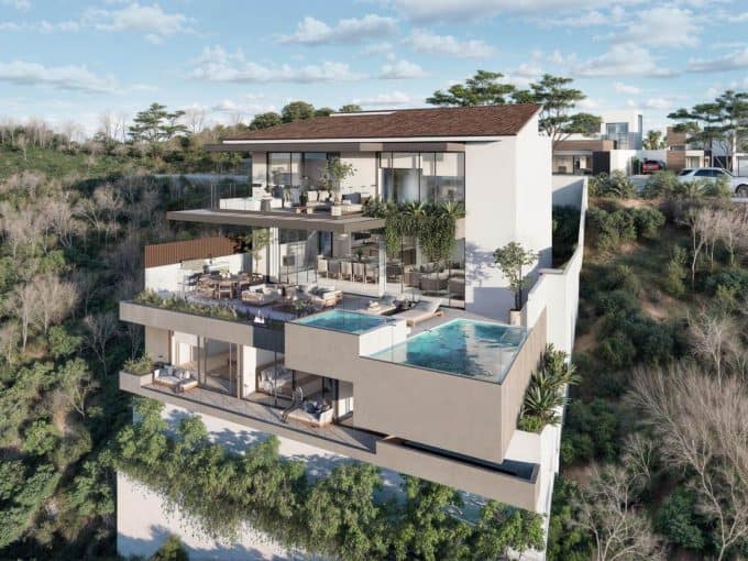 Luxurious Modern Home With Infinity Pool, Ocean Views, And Golf Course Backdrop At Club Campestre. Perfect For Relaxed Living And Scenic Vistas.