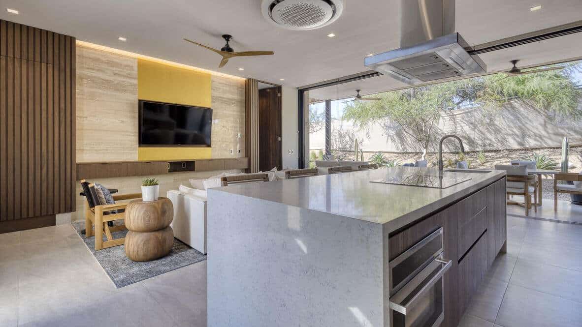 Ocean View Modern Kitchen With Golf Course Scenery, Open Living Space, Stylish Design, Natural Light, And Contemporary Furnishings At Club Campestre Real Estate.