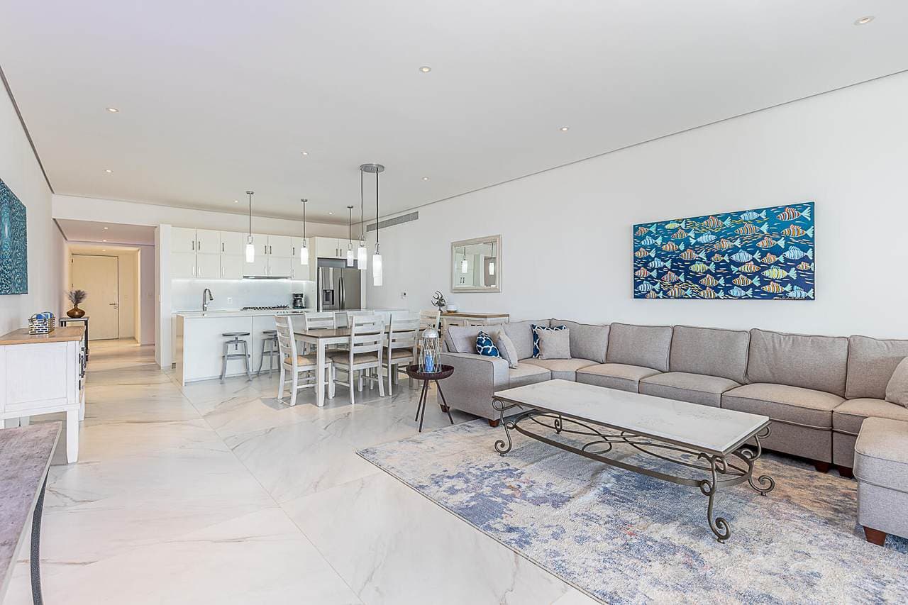 Enjoy The Spacious Living Area At Club Campestre With Modern Decor And Ocean Views, Perfect For Relaxing And Entertaining.