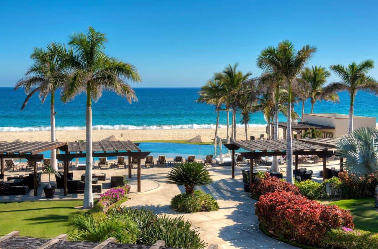 Club Campestre Ocean View Villa With Lush Landscaping And Palm Trees Overlooking The Beach.