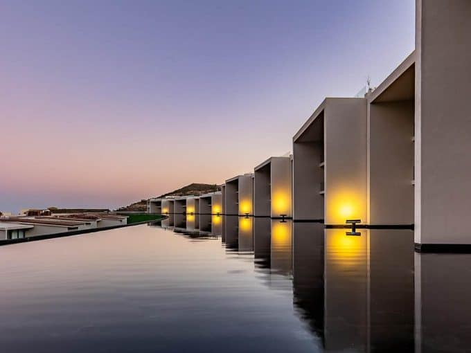 Club Campestre Ocean View Villas At Sunset With Infinity Pool And Modern Architecture.