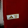 Producto oficial adidas, etiqueta de licencia auténtica para artículos deportivos.