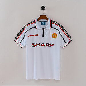 Camisa de fútbol Manchester United vintage, ideal para coleccionistas y fans deportivos.