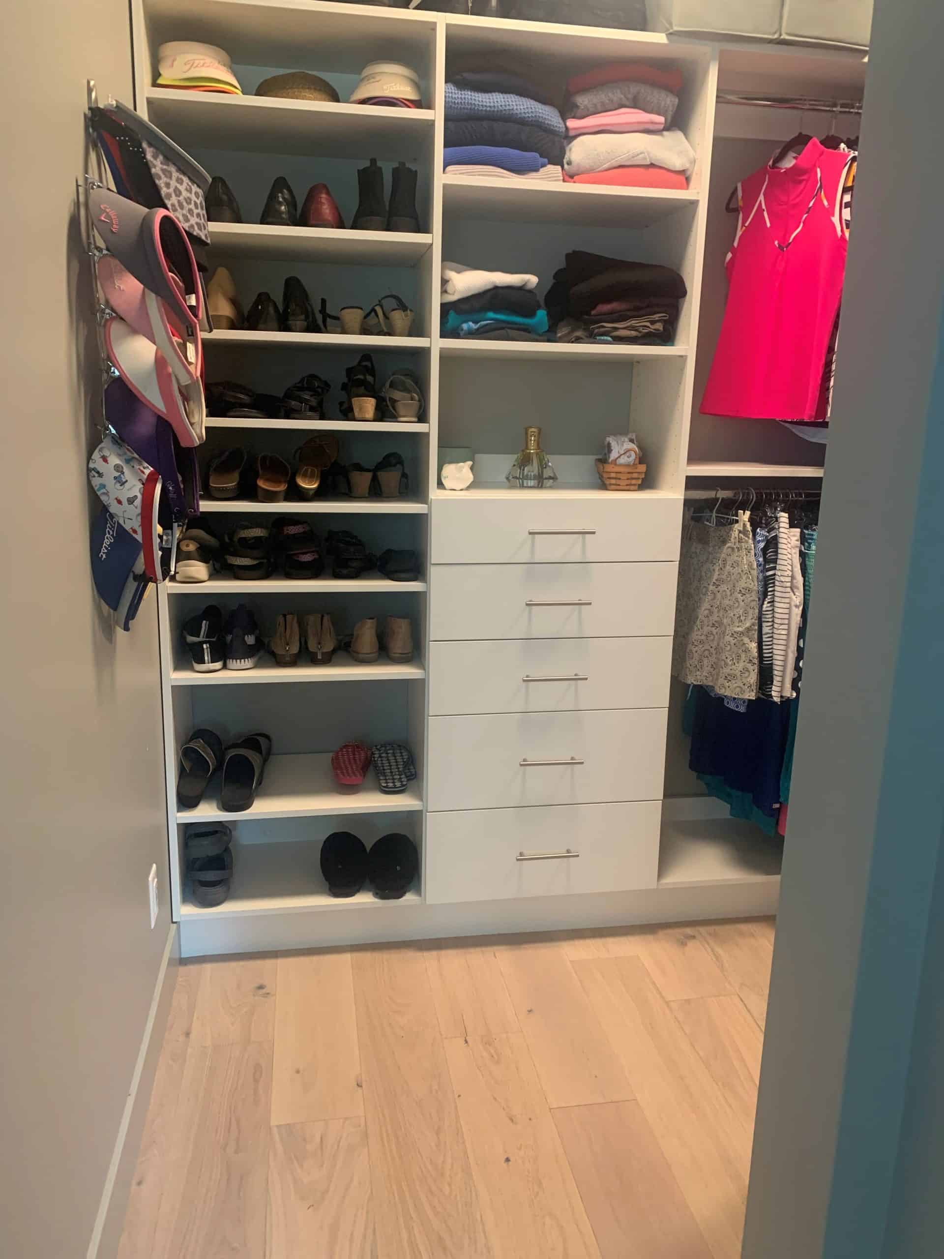Custom closet with organized shoes, clothes, and accessories in Durango, Colorado.