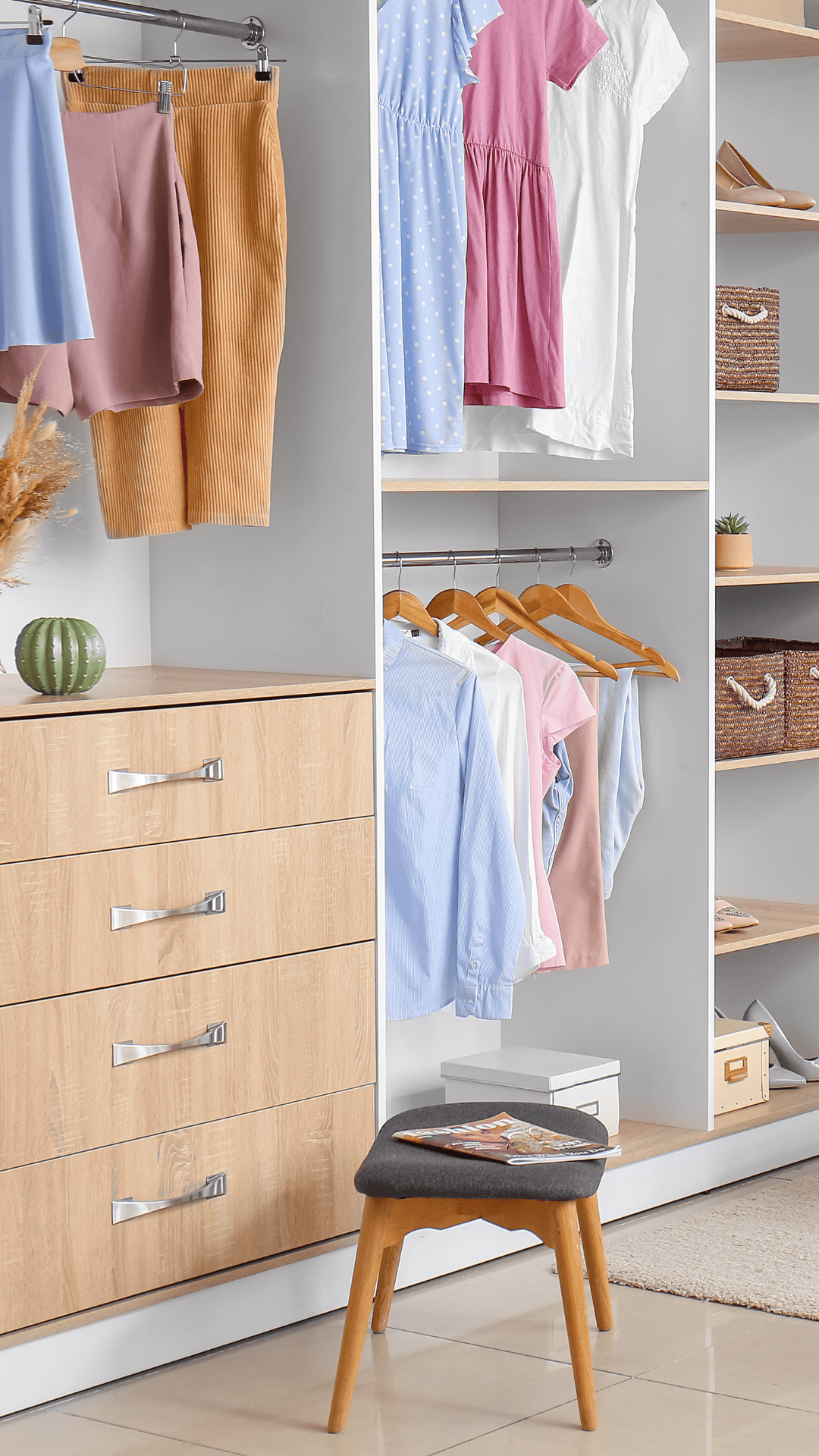 Organized closet with colorful dresses, shirts, and storage baskets.