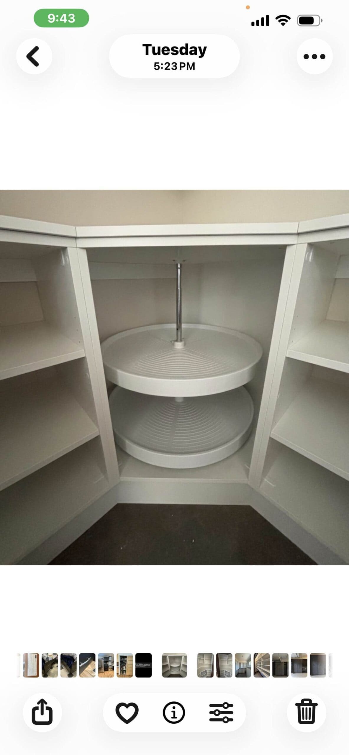 Custom corner closet with circular shelf and storage space in Durango.