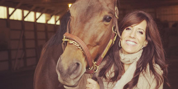 Pamela Saloom with one of her horses.